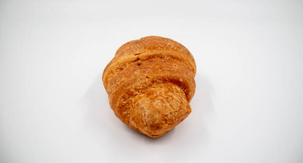 istock Croissant close up on white background isolated. 1961780827