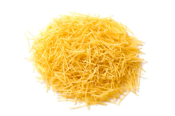 istock A pile of small noodles on a white background. 1961821102