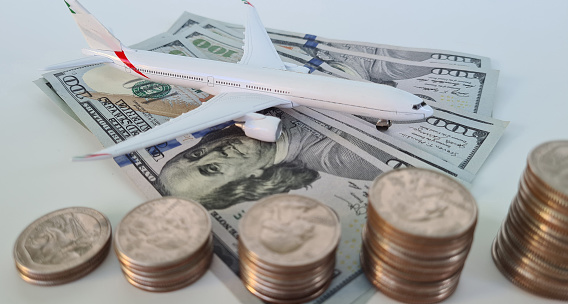 Passenger aircraft and rising airfare. Discount and booking air ticket. Flight inflation and fuel squandering
