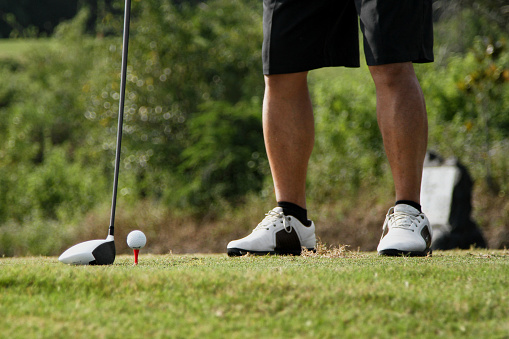 Golfers hit sweeping golf course