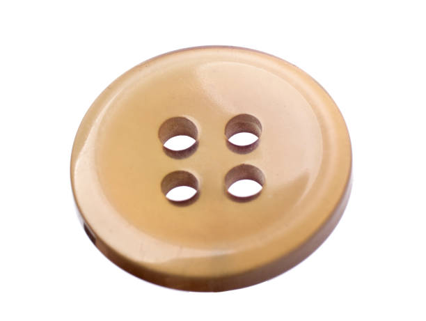 Close up of plastic buttons, isolated on a white background.
