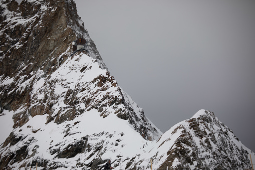 A man competes in a enduro mountain bike downhill race.