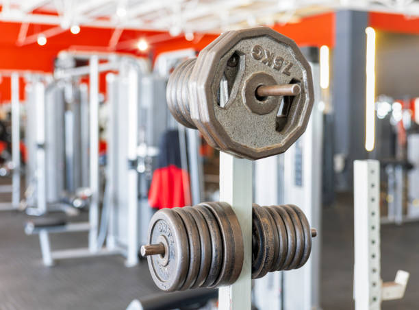 istock gym weights in the hall on the stand, strength training or resistance training involves the performance of physical exercises that are designed to improve strength and endurance 1961907796