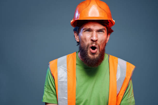 istock emotional worker orange hard hat construction cropped view 1961939951