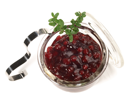 Cranberriy Jam in a Glass on white Background
