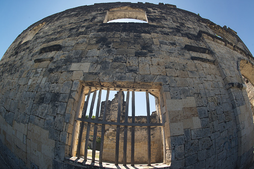 Ruins of Oslob  or Parish Church at Oslob ,Cebu in Philippines. This is a terrific coral built edifice. Begun in the late 1800s to house Spanish Army soldiers but was halted in 1899.The coal stone construction utilized a bell tower's crumbled ruins.