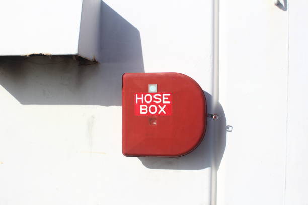 istock Fire extinguisher near the ship's door 1961998648