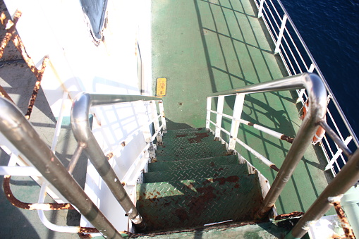 Green stairs on the ship