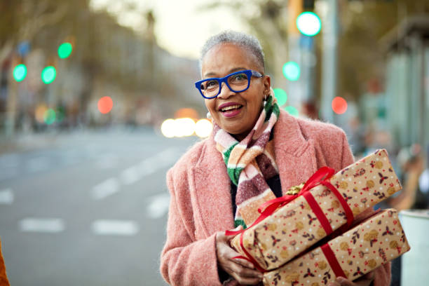 Candid view of Christmas shopper looking for transportation