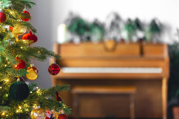 istock Christmas background with decorated Christmas tree and piano, copy space. 1962028067