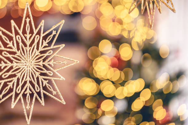 istock Christmas background with decorative snowflake with bokeh lights. 1962028081