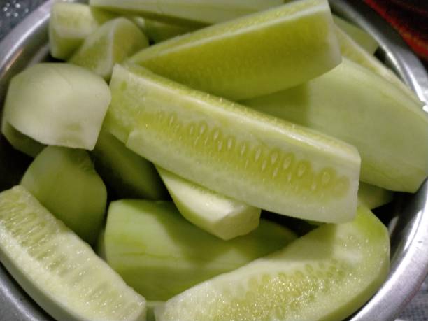 istock Sliced cucumber in a colander. Close up. 1962035448