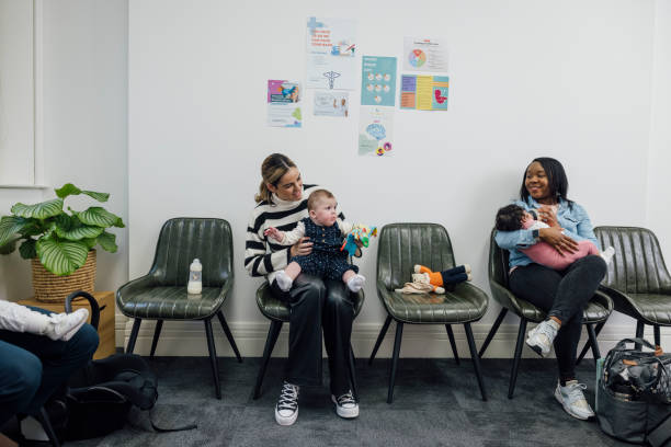istock Mothers and Babies in a Waiting Room 1962093103