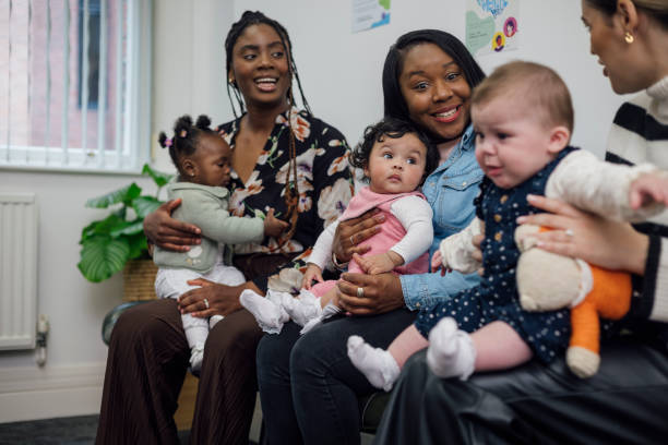 istock Mothers Chatting at Baby Clinic 1962094247