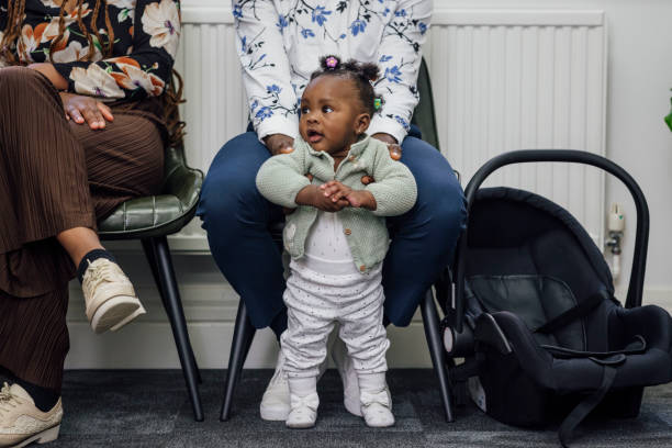 istock Baby Standing with Support of Father 1962094268