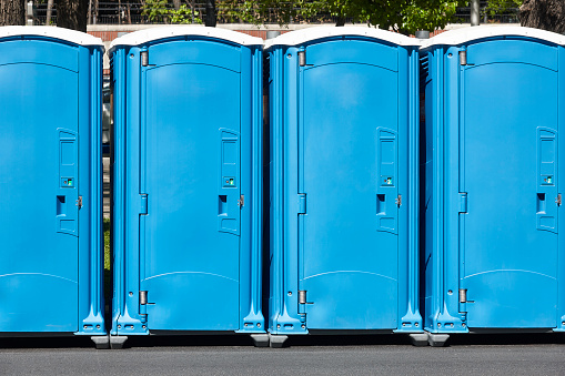 Portable wc. Public mobile toilet in the street. Transportable latrine