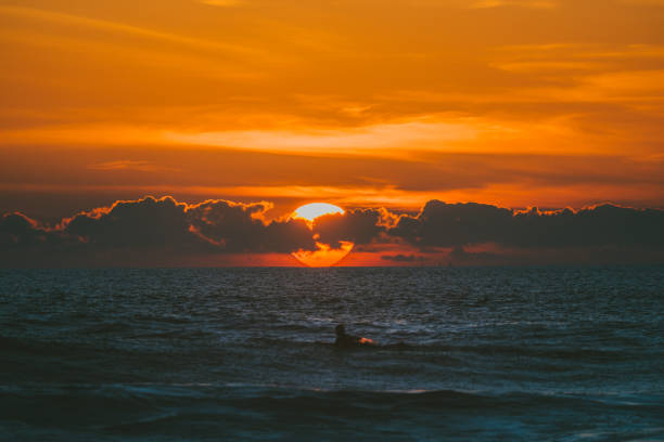 istock AWESOME SUNSET WITH THE SUN BETWEEN THE CLOUDS 1962124082