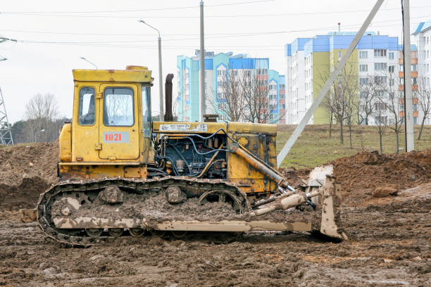Minsk, Belarus - March 25, 2010: A close-up of a crawler bulldozer at a construction site.