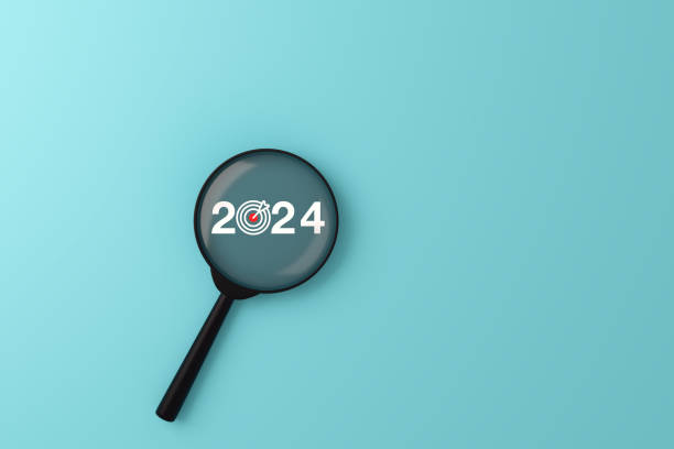 istock the number 2024  with target icon  in side the magnifying glass. 1962225880