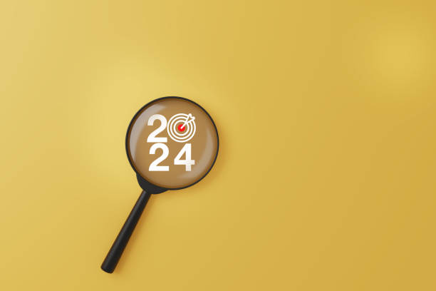 istock the number 2024  with target icon  in side the magnifying glass. 1962225885