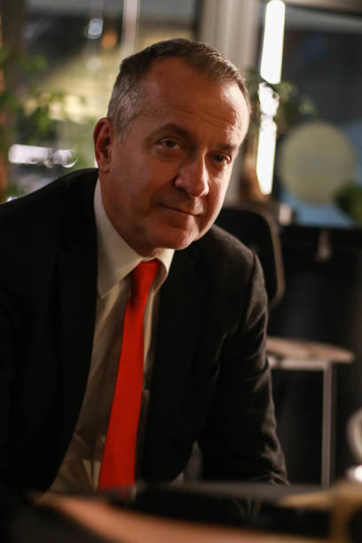 istock Mature gentleman sitting on chair 1962238151