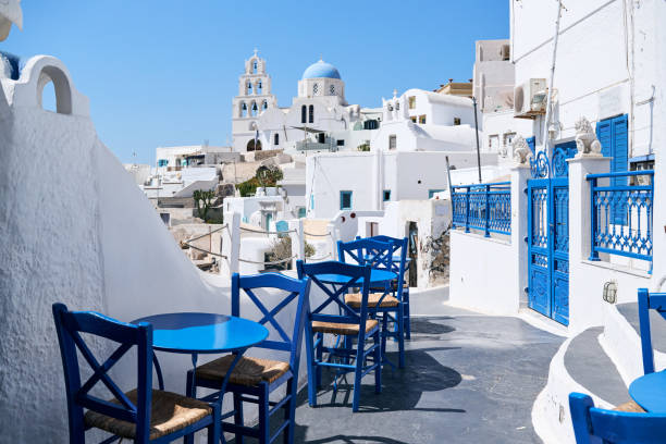 istock Blue tables and chairs in Pyrgos, Santorini, Greece 1962242945
