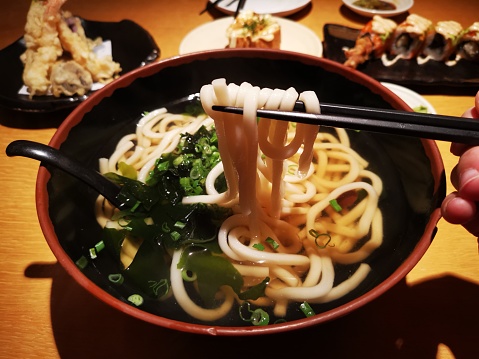 Focus scene on Japanese food - Udon Soup in restaurant