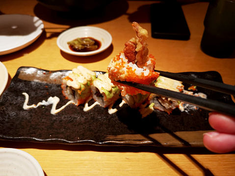 Focus scene on Japanese sushi in restaurant