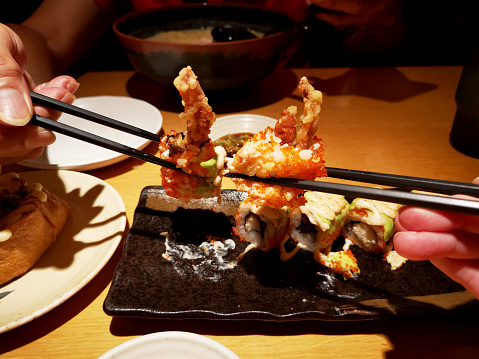 Focus scene on Japanese sushi in restaurant