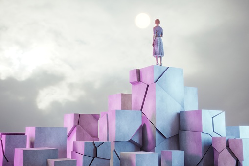Business woman is standing on the top of the concrete cracked platforms. (3d render)