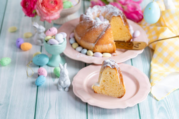 istock Easter yeast cake sprinkled with powdered sugar, decorated with chocolate eggs. 1962344433