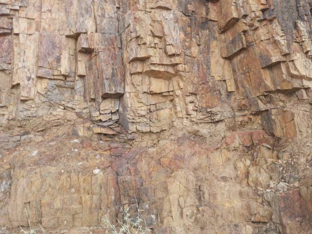 istock Brown to yellow rocky mountain background, close-up view 1962348725