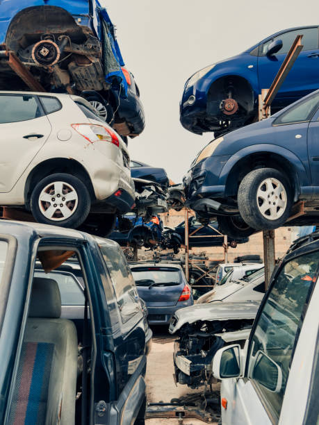 istock stacked cars on car scrapping center 1962368763