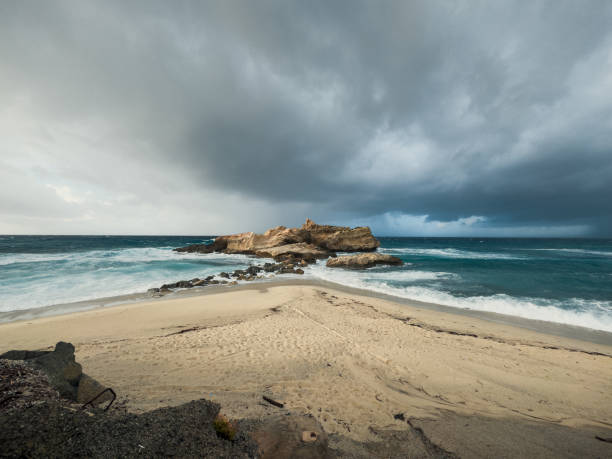 istock beach with stormy sea in winter 1962374995