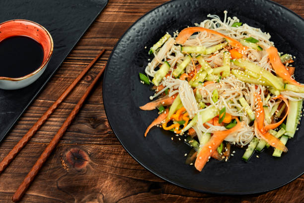 istock Chinese salad with enoki mushrooms. 1962377618