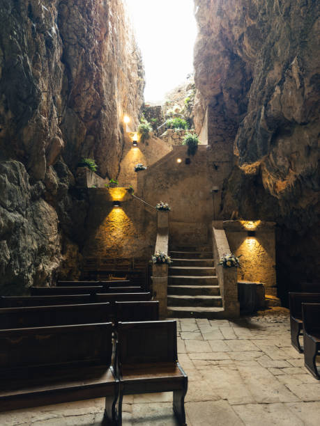 istock ancient Catholic church located in a natural cave 1962389165