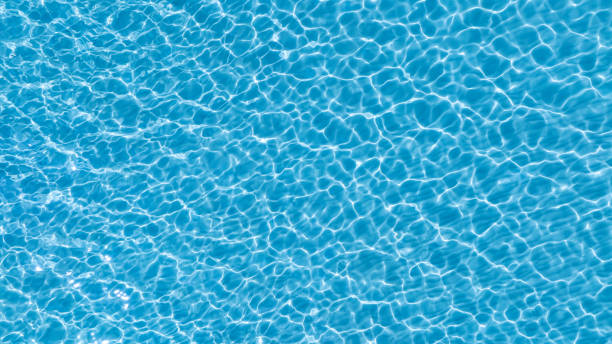istock Summer Tropical beach water  with crystal clear water on beach background 1962392317