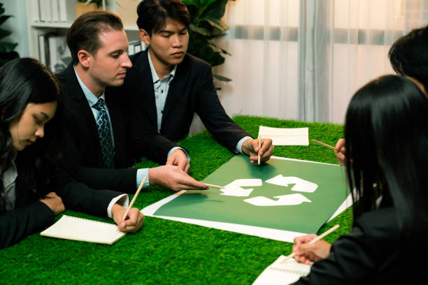 istock Recycle icon on meeting table with business people. Quaint 1962394445
