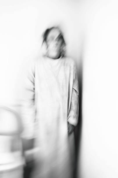 istock Unrecognizable woman with anxiety in black and white 1962397087