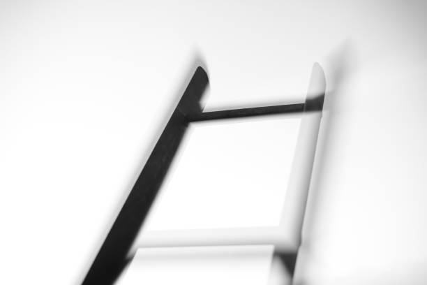 Black and white abstract ladder pattern in motion blur.