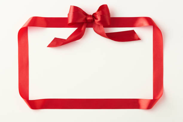 istock Red ribbon shaped like valentine card on light background. Top view. Copy space 1962424320