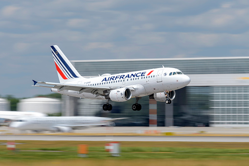 Munich, Germany - July 06. 2023 : Air France Airbus A318-111 with the aircraft registration F-GUGO during landing on the southern runway 08R of the Munich Airport MUC EDDM
