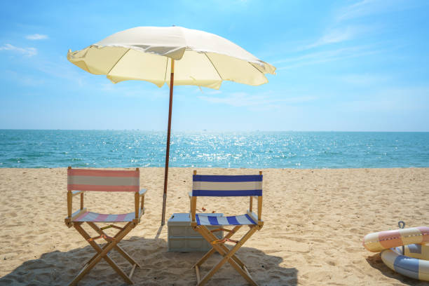 istock Chair and Umbrella on a Tranquil Beach 1962435466