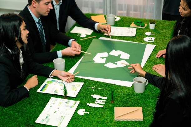 istock Recycle icon on meeting table with business people. Quaint 1962438025