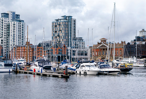 A view of Wherry Quay and Common Quay on Ipswich Waterfront, with part of the Neptune Marina. Ipswich Waterfront is now a popular cultural and historic district surrounding the Marina, and is home to the University of Suffolk main campus as well as galleries, studios, restaurants and bars. Many of the old buildings have been converted and new apartment blocks have been constructed.
