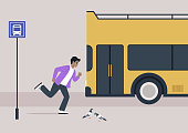 In the hustle of daily life, a young individual sprints to catch a bus that has just departed from the stop, capturing the essence of the stressful and dynamic nature of daily commuting