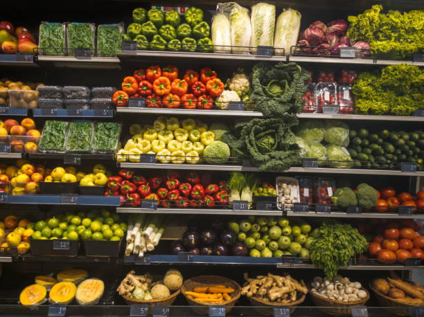 istock supermarket rack full of various vegetables 1962507408