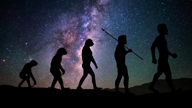 Human Evolution: Time Lapse by Night with Stars and Milky Way.