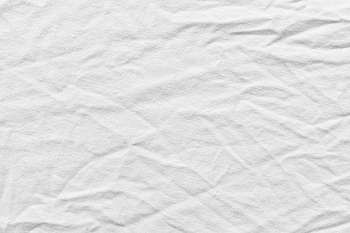 Blank white crumpled material.