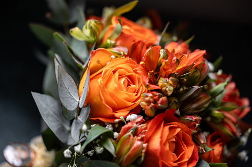 Beautiful orange wedding rose flower bouquet for bride